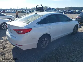 2017 Hyundai Sonata 2.4L with VIN 5NPE24AF9HH585587, listed as a IAAI auction lot 41609567 with 157,029 mi miles. Bid and sale history available at carsss.com. Image 4.