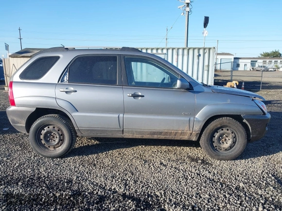 2006 Kia Sportage LX with VIN KNDJE723X67242610, listed as a IAAI auction lot 41735144 with 244,979 mi miles and . Bid and sale history available at DreamBid. Image 13.