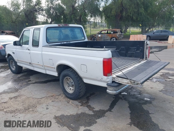 1996 Ford F-150 with VIN 1FTEX15H9TKA56551, listed as a IAAI auction lot 41674788 with 314,443 mi miles. Bid and sale history available at carsss.com. Image 3.