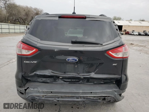 2014 Ford Escape SE with VIN 1FMCU0GX8EUB08186, listed as a Copart auction lot 48189035 with 128,483 mi miles and Salvage Title. Bid and sale history available at carsss.com. Image 6.
