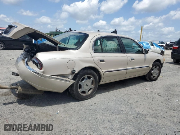 2001 Lincoln Continental z VIN 1LNHM97V91Y622267, wystawiony jako Copart lot #59915445 z przebiegiem 77 070 mil mil oraz Szkoda całkowita • Salvage title. Historia ofert i sprzedaży dostępna na DreamBid. Obrazek 3.