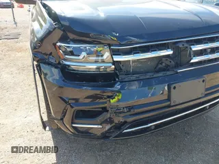 2019 Volkswagen Atlas SEL R-Line z VIN 1V2RR2CA0KC579035, wystawiony jako IAAI lot #42205407 z przebiegiem 66 188 mil mil oraz . Historia ofert i sprzedaży dostępna na DreamBid. Obrazek 6.