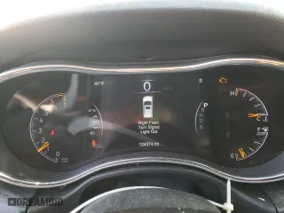 2015 Jeep Grand Cherokee Altitude with VIN 1C4RJFAG0FC136039, listed as a Copart auction lot 89237525 with 124,374 mi miles and Salvage Title. Bid and sale history available at carsss.com. Image 9.