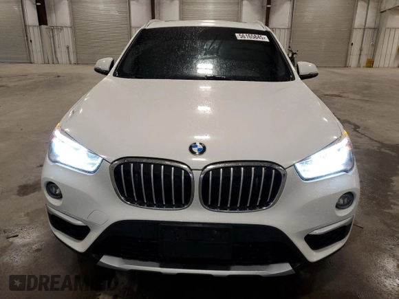 2018 BMW X1 xDrive28i with VIN WBXHT3C30J5K29917, listed as a Copart auction lot 56165845 with 131,876 mi miles and Salvage title. Bid and sale history available at DreamBid. Image 5.