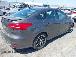 2016 Ford Focus SE with VIN 1FADP3F29GL289322, listed as a IAAI auction lot 42545155 with 141,120 mi miles and . Bid and sale history available at DreamBid. Image 4.