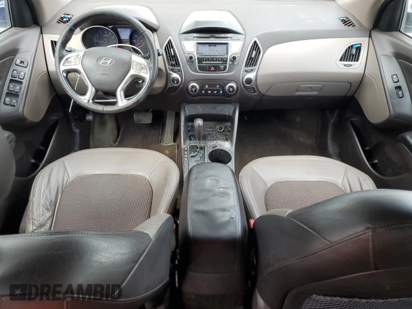 2010 Hyundai Tucson GLS with VIN KM8JU3AC9AU113714, listed as a Copart auction lot 55263765 with 193,175 mi miles and Salvage Title. Bid and sale history available at DreamBid. Image 8.