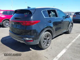 2021 Kia Sportage S with VIN KNDP6CAC6M7887592, listed as a IAAI auction lot 41852917 with 52,185 mi miles and . Bid and sale history available at DreamBid. Image 4.