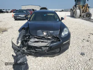 2016 Porsche Panamera 4 z VIN WP0AA2A75GL002442, wystawiony jako Copart lot #50608145 z przebiegiem 57 217 mil mil oraz Szkoda całkowita • Salvage title. Historia ofert i sprzedaży dostępna na DreamBid. Obrazek 5.