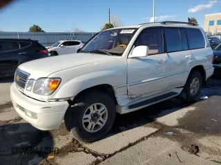 2001 Lexus LX 470 with VIN JTJHT00W413506068, listed as a Copart auction lot 80335644 with 289,064 mi miles and Salvage Title. Bid and sale history available at carsss.com. Image 1.