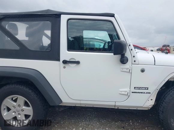2015 Jeep Wrangler Sport with VIN 1C4AJWAG5FL757161, listed as a IAAI auction lot 41932705 with 172,519 mi miles and . Bid and sale history available at DreamBid. Image 14.