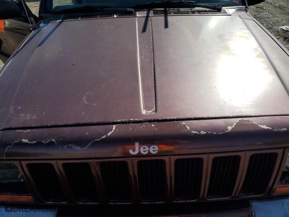 2000 Jeep Cherokee Police with VIN 1J4FF48S3YL141168, listed as a Copart auction lot 71612494 with NaN miles and Salvage Title. Bid and sale history available at carsss.com. Image 12.