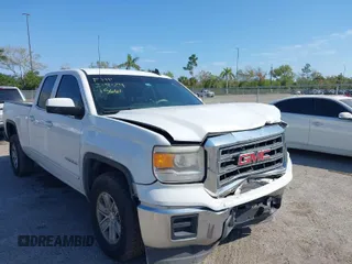 2015 GMC Sierra 1500 SLE z VIN 1GTR1UEC3FZ154334, wystawiony jako IAAI lot #38750822 z przebiegiem 198 769 mil mil oraz . Historia ofert i sprzedaży dostępna na DreamBid. Obrazek 1.