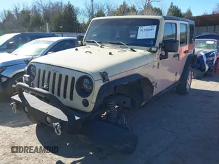 2012 Jeep Wrangler Unlimited Sport z VIN 1C4BJWDG8CL102486, wystawiony jako IAAI lot #41386649 z przebiegiem 156 993 mil mil oraz . Historia ofert i sprzedaży dostępna na DreamBid. Obrazek 17.