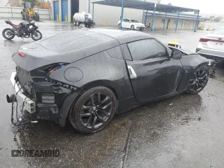 2017 Nissan 370Z z VIN JN1AZ4EH7HM952775, wystawiony jako Copart lot #81940704 z przebiegiem Nie podano mil oraz Szkoda całkowita • Salvage title. Historia ofert i sprzedaży dostępna na DreamBid. Obrazek 3.