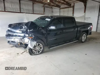 2018 Chevrolet Silverado 1500 LT with VIN 3GCUKREC2JG345482, listed as a Copart auction lot 52452445 with 100,824 mi miles and Salvage Title. Bid and sale history available at DreamBid. Image 1.