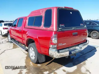 2014 Toyota Tacoma PreRunner with VIN 3TMKU4HN4EM041871, listed as a IAAI auction lot 41641763 with 148,968 mi miles and . Bid and sale history available at DreamBid. Image 3.