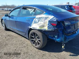 2023 Tesla Model 3 with VIN 5YJ3E1EA2PF690335, listed as a IAAI auction lot 41732701 with 22,238 mi miles and . Bid and sale history available at DreamBid. Image 6.
