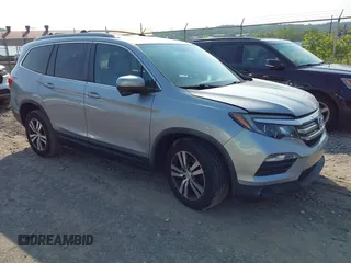 2017 Honda Pilot EX-L z VIN 5FNYF6H55HB087797, wystawiony jako IAAI lot #42376979 z przebiegiem 52 725 mil mil oraz . Historia ofert i sprzedaży dostępna na DreamBid. Obrazek 1.