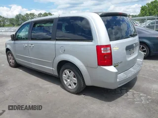 2009 Dodge Grand Caravan SE z VIN 1D8HN44E99B502171, wystawiony jako IAAI lot #42267604 z przebiegiem 166 131 mil mil oraz . Historia ofert i sprzedaży dostępna na DreamBid. Obrazek 3.
