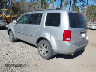 2010 Honda Pilot Touring with VIN 5FNYF4H91AB020868, listed as a IAAI auction lot 41783104 with 298,022 mi miles and . Bid and sale history available at carsss.com. Image 3.