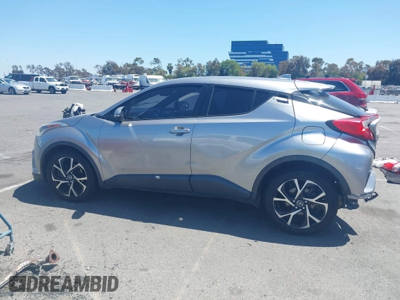 2018 Toyota C-HR XLE z VIN NMTKHMBX2JR057798, wystawiony jako IAAI lot #42327724 z przebiegiem 115 715 mil mil oraz . Historia ofert i sprzedaży dostępna na DreamBid. Obrazek 13.