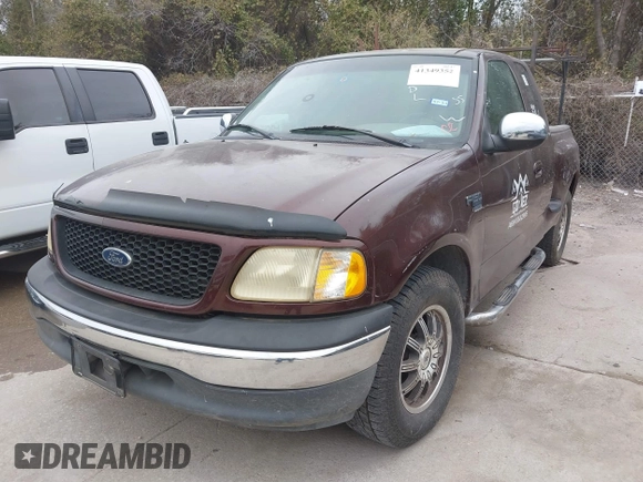 2001 Ford F-150 XL with VIN 2FTRX07W31CA59129, listed as a IAAI auction lot 41349352 with 272,026 mi miles. Bid and sale history available at carsss.com. Image 2.