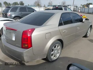 2003 Cadillac CTS with VIN 1G6DM57N730116792, listed as a IAAI auction lot 41686845 with 121,590 mi miles. Bid and sale history available at carsss.com. Image 4.
