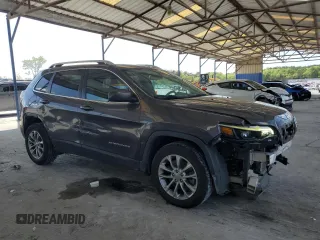 2019 Jeep Cherokee Latitude Plus z VIN 1C4PJLLB7KD241334, wystawiony jako Copart lot #52323575 z przebiegiem 82 570 mil mil oraz Szkoda całkowita • Salvage title. Historia ofert i sprzedaży dostępna na DreamBid. Obrazek 4.