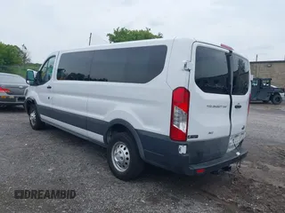 2023 Ford Transit Passenger XL with VIN 1FBAX9Y83PKC08567, listed as a IAAI auction lot 39883261 with 15,028 mi miles and . Bid and sale history available at DreamBid. Image 3.