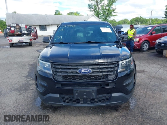 2018 Ford Police Interceptor Utility z VIN 1FM5K8AR4JGB93026, wystawiony jako IAAI lot #41975110 z przebiegiem 104 386 mil mil oraz . Historia ofert i sprzedaży dostępna na DreamBid. Obrazek 13.