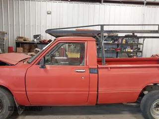 1983 Toyota Pickup z VIN JT4RN44R8D1137485, wystawiony jako IAAI lot #41741970 z przebiegiem 328 446 mil mil oraz . Historia ofert i sprzedaży dostępna na DreamBid. Obrazek 15.