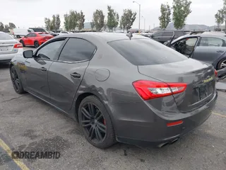 2016 Maserati Ghibli S Q4 z VIN ZAM57RTA0G1177125, wystawiony jako IAAI lot #42073335 z przebiegiem 114 663 mil mil oraz . Historia ofert i sprzedaży dostępna na DreamBid. Obrazek 3.