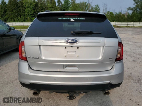 2014 Ford Edge SEL z VIN 2FMDK4JC5EBB58914, wystawiony jako Copart lot #58788645 z przebiegiem 252 695 mil mil oraz Szkoda całkowita • Salvage title. Historia ofert i sprzedaży dostępna na DreamBid. Obrazek 6.