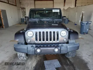 2017 Jeep Wrangler Sahara z VIN 1C4AJWBG6HL582839, wystawiony jako Copart lot #52049725 z przebiegiem 143 544 mil mil oraz Szkoda całkowita • Salvage title. Historia ofert i sprzedaży dostępna na DreamBid. Obrazek 5.
