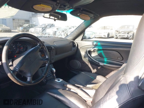 1999 Porsche 911 with VIN WP0CA2999XS652816, listed as a IAAI auction lot 41975822 with 291,258 mi miles and . Bid and sale history available at DreamBid. Image 18.