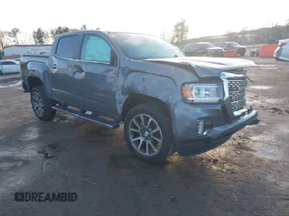 2021 GMC Canyon 4WD Denali with VIN 1GTG6EEN2M1123409, listed as a IAAI auction lot 41486932 with 1 mi miles. Bid and sale history available at carsss.com. Image 1.