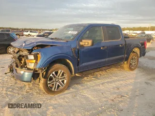 2023 Ford F-150 XL with VIN 1FTFW1E51PKF30933, listed as a Copart auction lot 82439694 with 26,267 mi miles and Salvage Title. Bid and sale history available at carsss.com. Image 1.