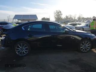 2020 Mazda 3 Premium with VIN 3MZBPAEM2LM124405, listed as a IAAI auction lot 41478818 with 72,551 mi miles and . Bid and sale history available at DreamBid. Image 14.