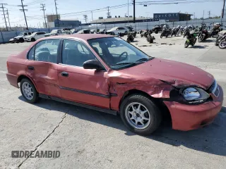 1999 Honda Civic LX with VIN 1HGEJ6670XL002593, listed as a Copart auction lot 68564474 with 255,621 mi miles and Salvage Title. Bid and sale history available at carsss.com. Image 4.