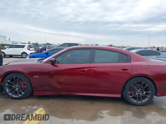 2020 Dodge Charger Scat Pack z VIN 2C3CDXGJ8LH132985, wystawiony jako IAAI lot #41316849 z przebiegiem 66 881 mil mil oraz . Historia ofert i sprzedaży dostępna na DreamBid. Obrazek 14.