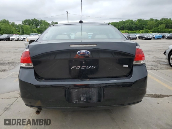 2009 Ford Focus SE z VIN 1FAHP35N69W138629, wystawiony jako Copart lot #58012605 z przebiegiem 155 557 mil mil oraz Szkoda całkowita • Salvage title. Historia ofert i sprzedaży dostępna na DreamBid. Obrazek 6.