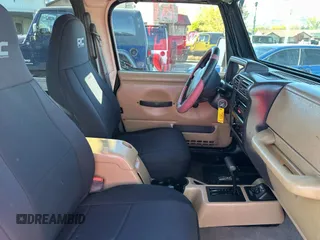 2002 Jeep Wrangler Sport with VIN 1J4FA49S32P765579, listed as a Copart auction lot 55244845 with 127,791 mi miles and Clean Title. Bid and sale history available at carsss.com. Image 5.