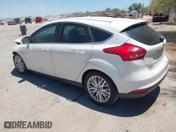 2016 Ford Focus Titanium with VIN 1FADP3N27GL319497, listed as a IAAI auction lot 42385359 with Not provided miles and . Bid and sale history available at DreamBid. Image 3.