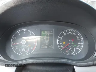 2012 Volkswagen Passat SE z VIN 1VWBP7A38CC087300, wystawiony jako IAAI lot #41752522 z przebiegiem 266 958 mil mil oraz . Historia ofert i sprzedaży dostępna na DreamBid. Obrazek 7.