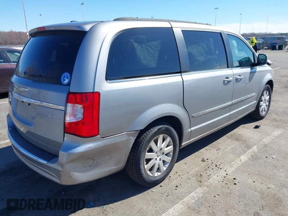 2013 Chrysler Town & Country Touring with VIN 2C4RC1BG9DR777819, listed as a IAAI auction lot 41824692 with 138,702 mi miles. Bid and sale history available at carsss.com. Image 4.