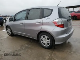 2009 Honda Fit with VIN JHMGE88289S036135, listed as a Copart auction lot 43289775 with 122,555 mi miles and Clean Title. Bid and sale history available at carsss.com. Image 2.