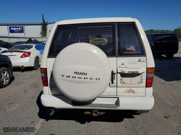 1999 Isuzu Trooper S with VIN JACDJ58X3X7917365, listed as a Copart auction lot 76065174 with 228,254 mi miles and Salvage Title. Bid and sale history available at carsss.com. Image 6.