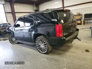 2011 GMC Yukon SLT with VIN 1GKS2CE05BR139136, listed as a Copart auction lot 89395985 with 245,690 mi miles and Salvage Title. Bid and sale history available at carsss.com. Image 2.