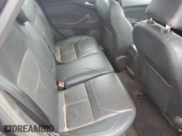 2017 Ford Focus Titanium z VIN 1FADP3N29HL240527, wystawiony jako Copart lot #62891695 z przebiegiem 126 926 mil mil oraz Szkoda całkowita • Salvage title. Historia ofert i sprzedaży dostępna na DreamBid. Obrazek 10.