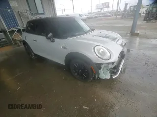 2014 MINI Hardtop S with VIN WMWXM7C57ET985421, listed as a Copart auction lot 49443335 with 76,168 mi miles and Salvage Title. Bid and sale history available at DreamBid. Image 12.